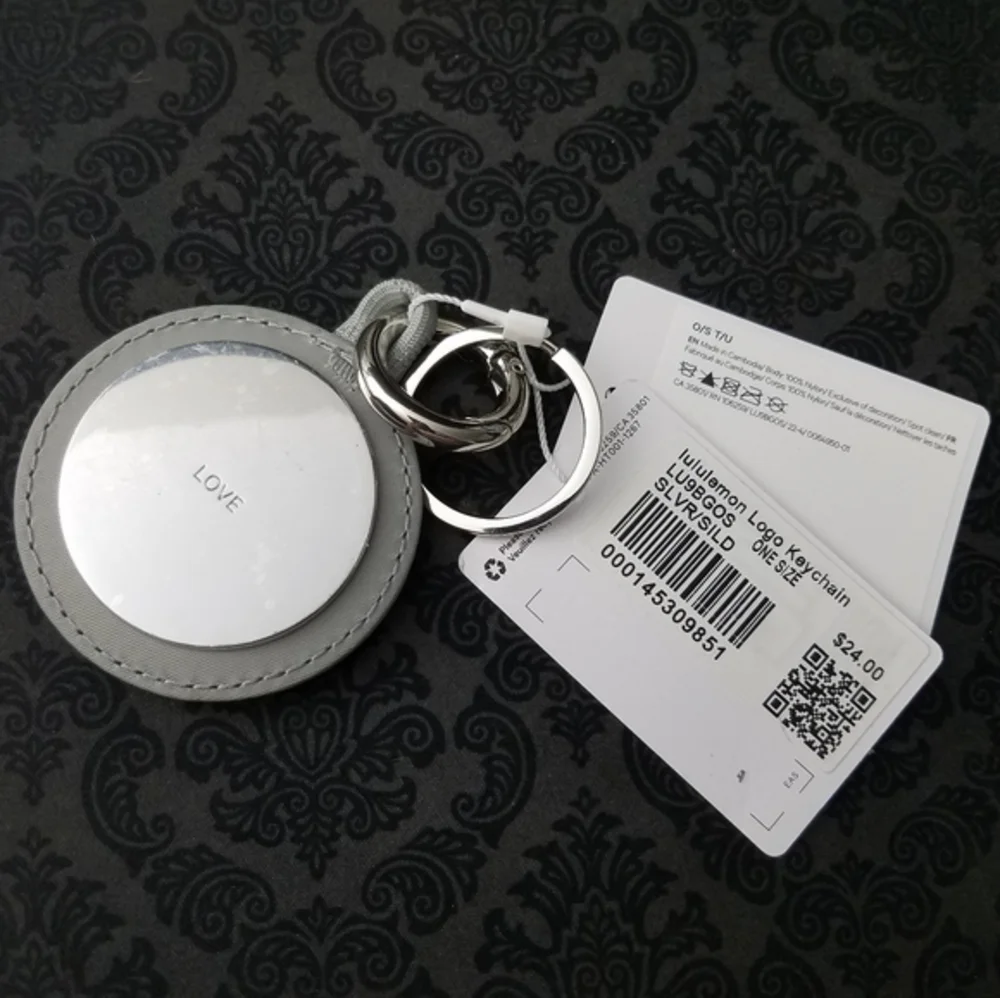 NWT Lululemon Unisex Logo Bag Charm & Keychain Silver/Silver Drop